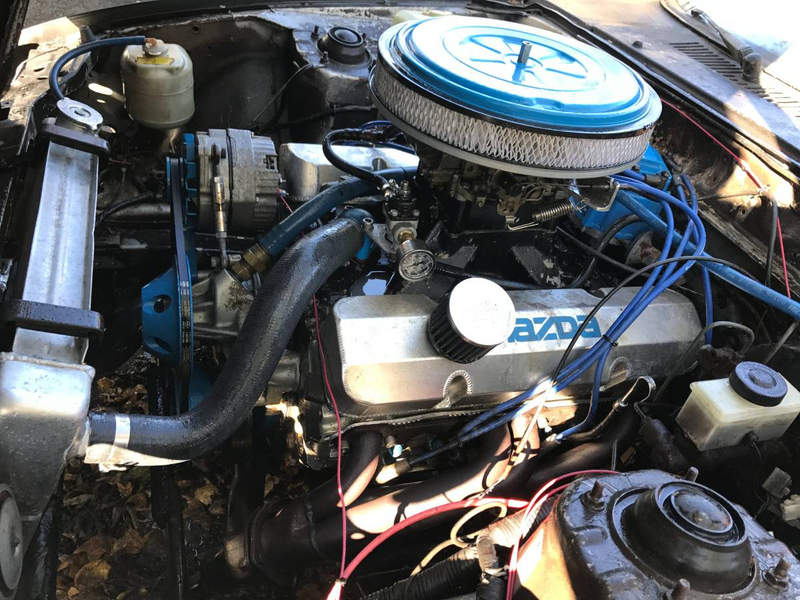 Illustration for article titled At $2,500, Could This 5.7-Powered 1985 Mazda RX7 Be The Prescription For Fun?